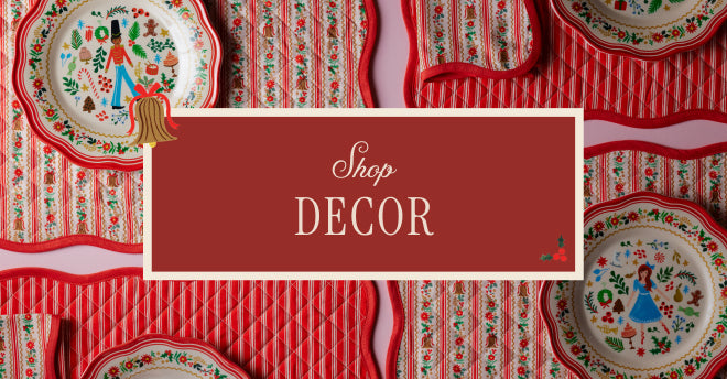 Decorative plates with a red banner displaying 'Shop Decor' on a patterned background.